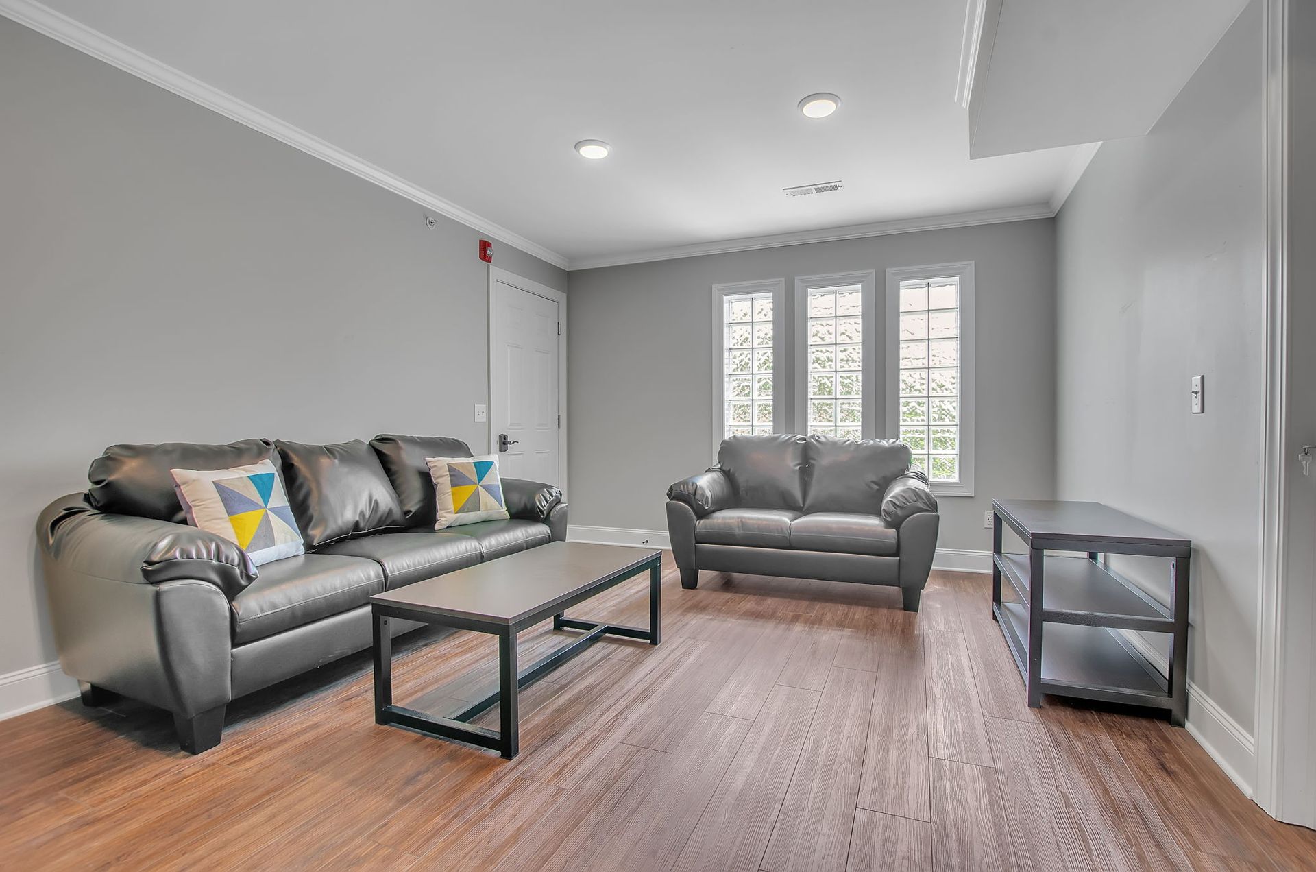 A living room with two couches and a coffee table.