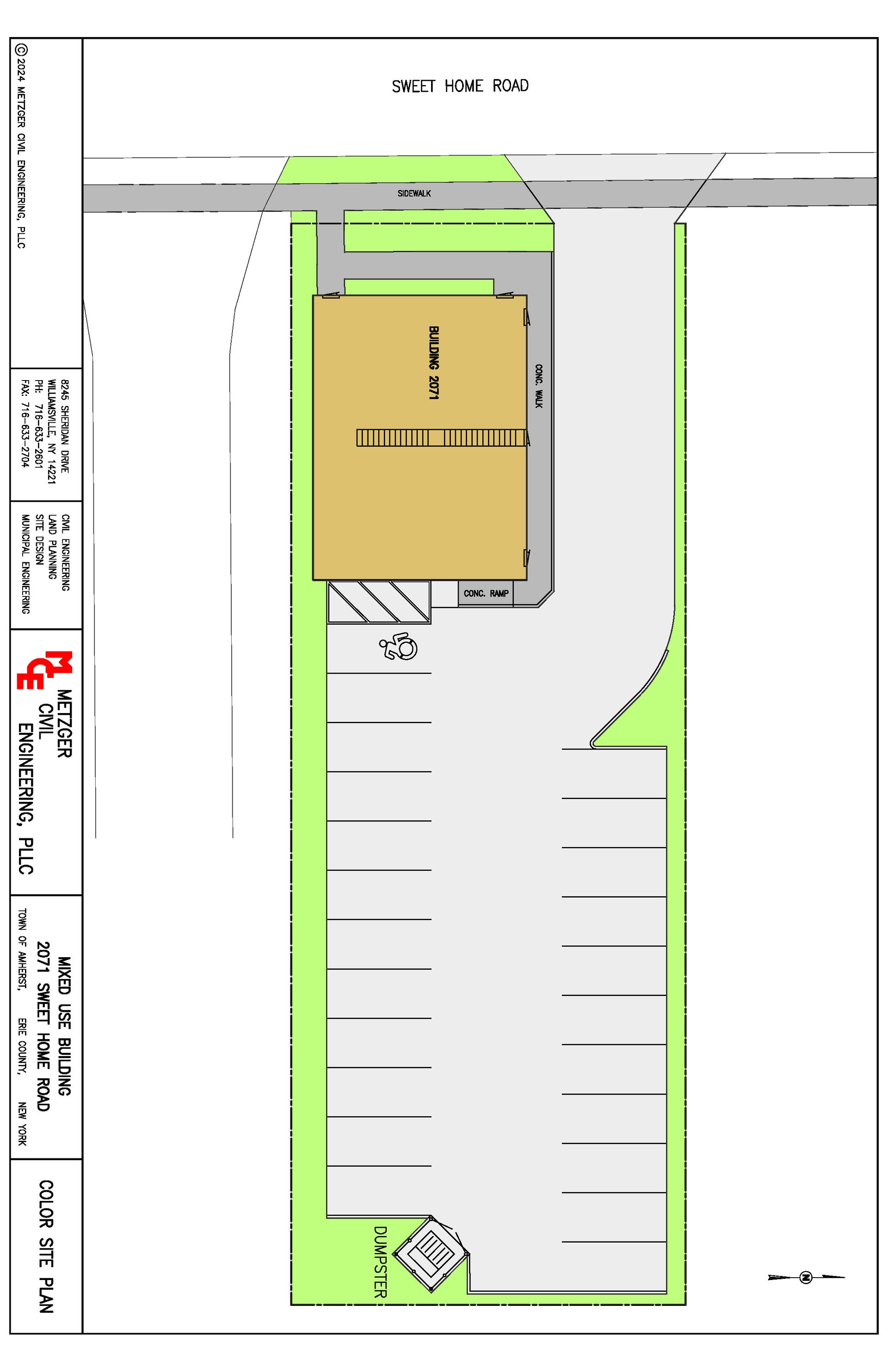 An aerial view of a parking lot with a building in the middle