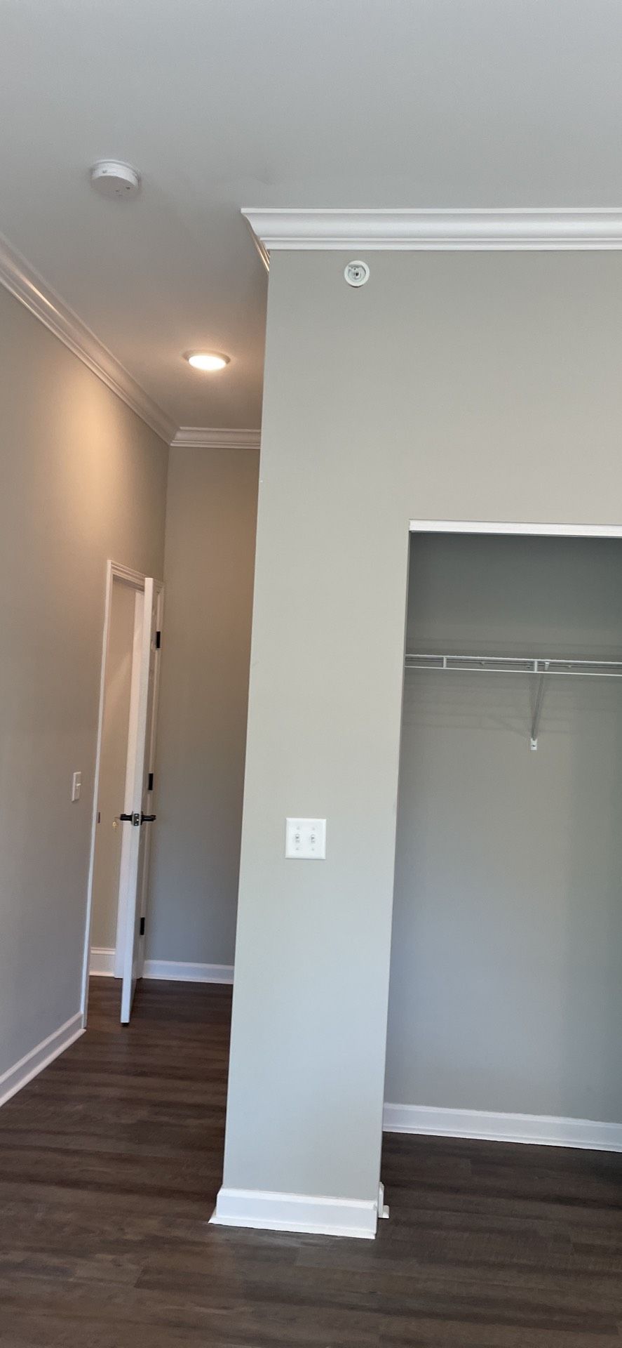 There is a closet in the middle of the room.