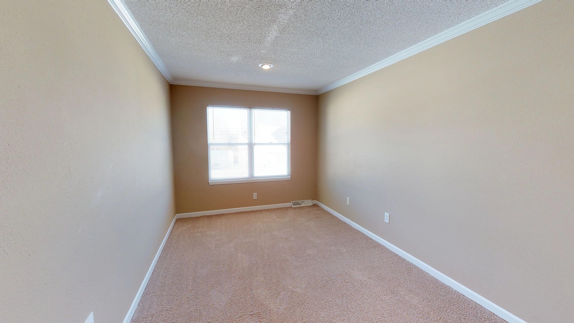 There is a window in the middle of the room.