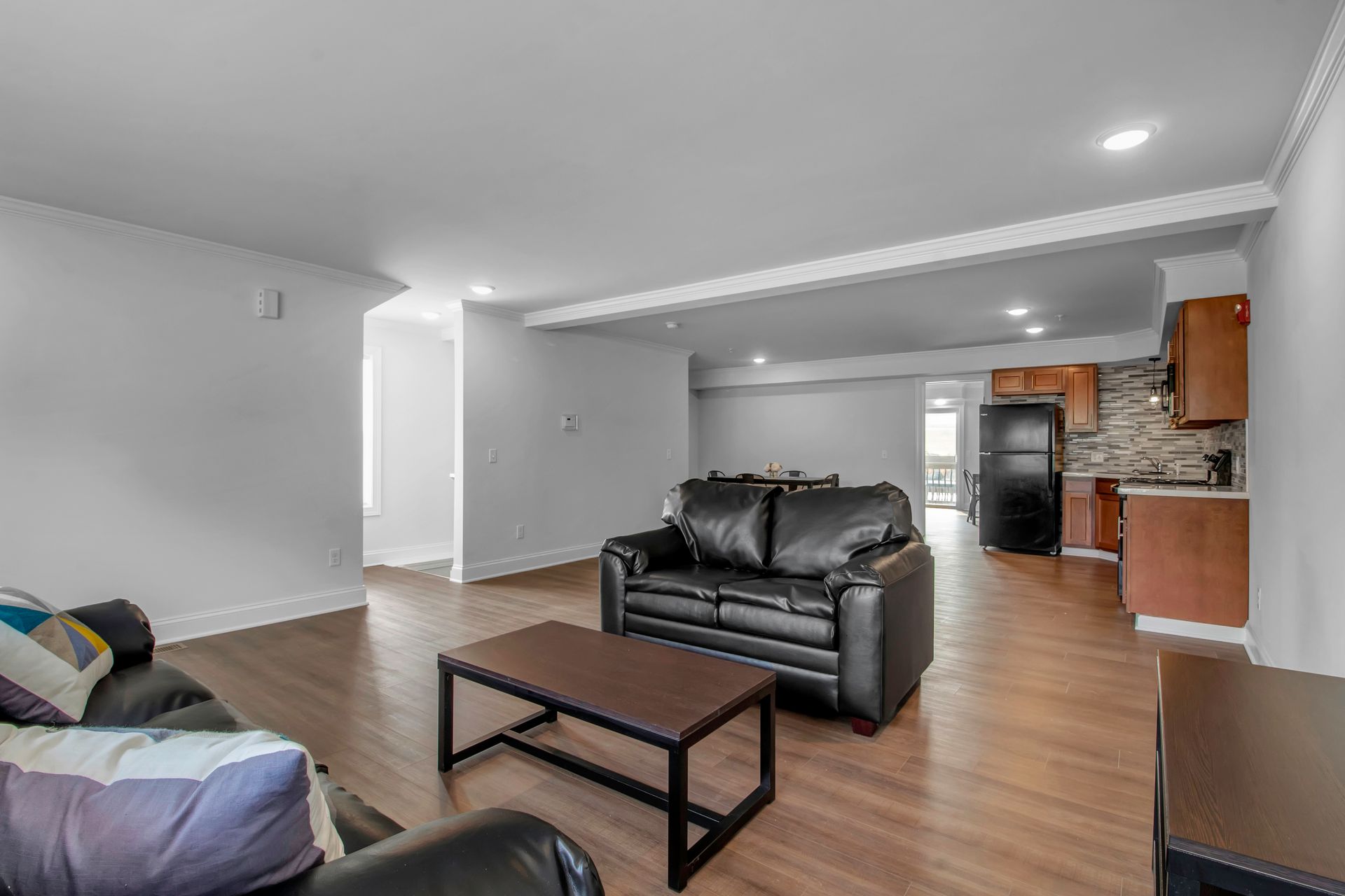 There is a couch and a coffee table in the living room.