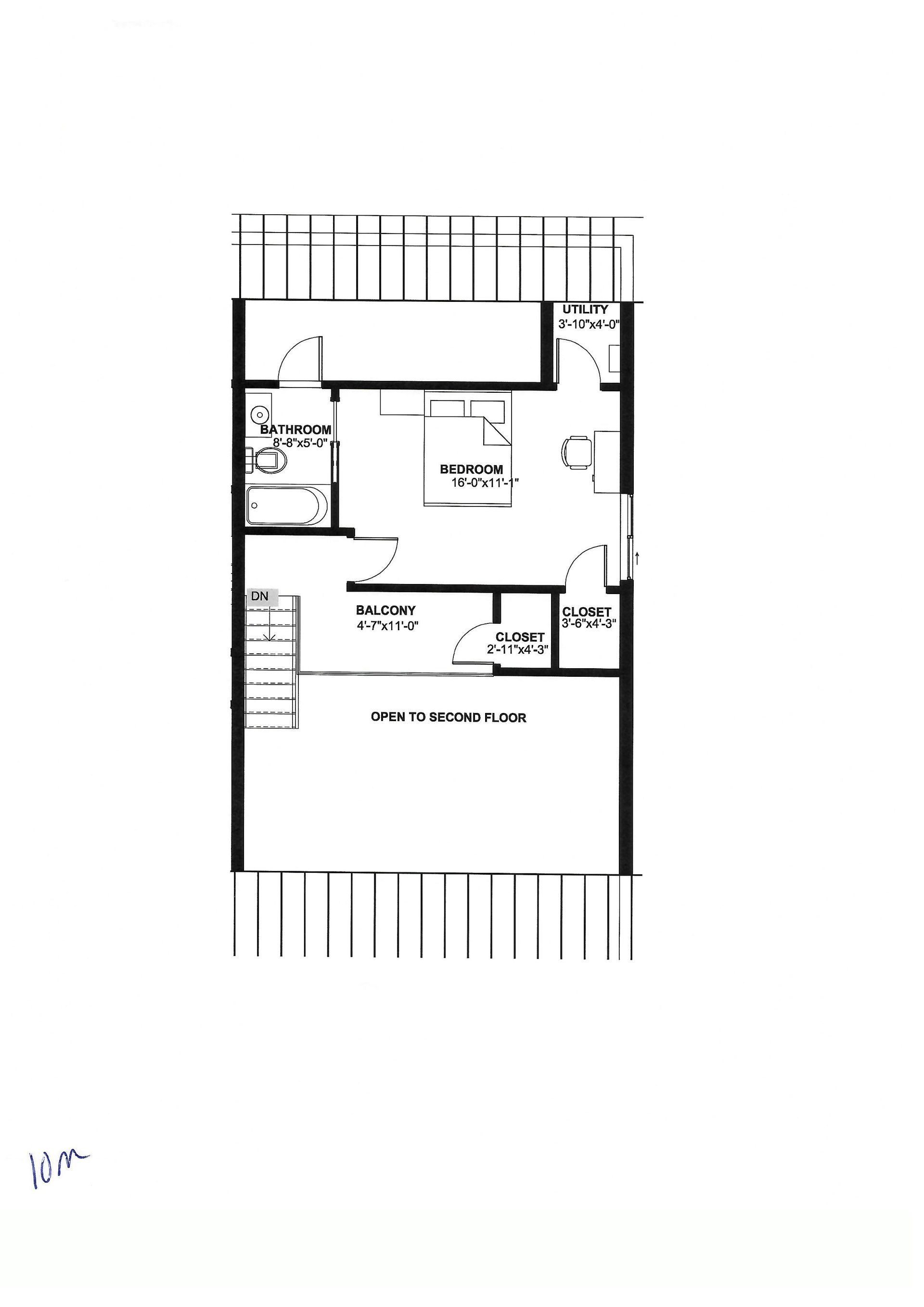 A black and white floor plan of a house with a balcony.