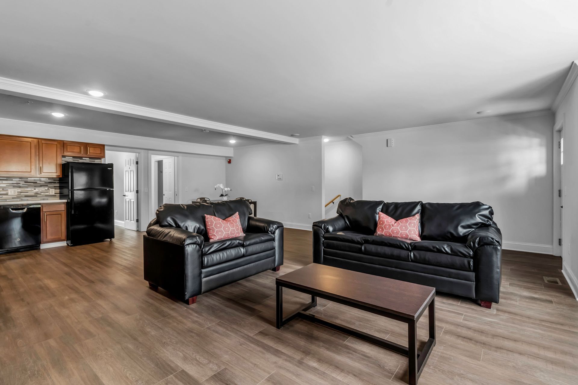 A living room with two couches and a coffee table.