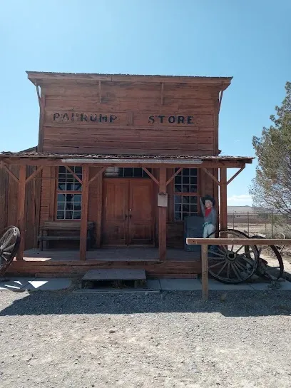 A wooden building with the word store on it