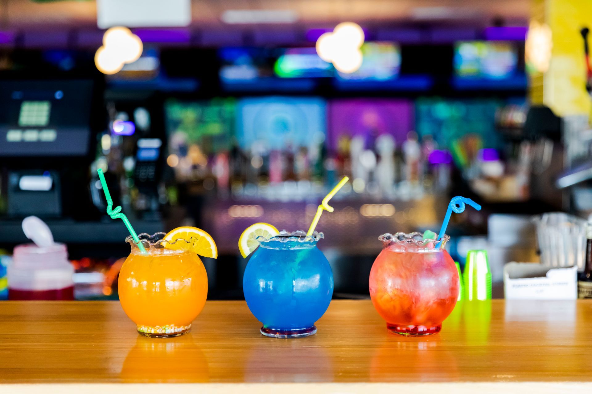 Endzone Sports Bar in Pittsburgh, PA featuring over 100 beers, 20 rotating drafts, large-screen TVs for sports viewing, and a lively atmosphere inside Zone 28 entertainment center.