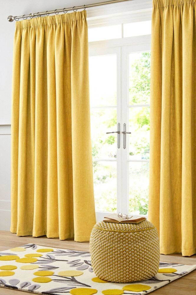 A Living Room With Yellow Curtains And A Rug — Caba's Drapery In Coffs Harbour, NSW
