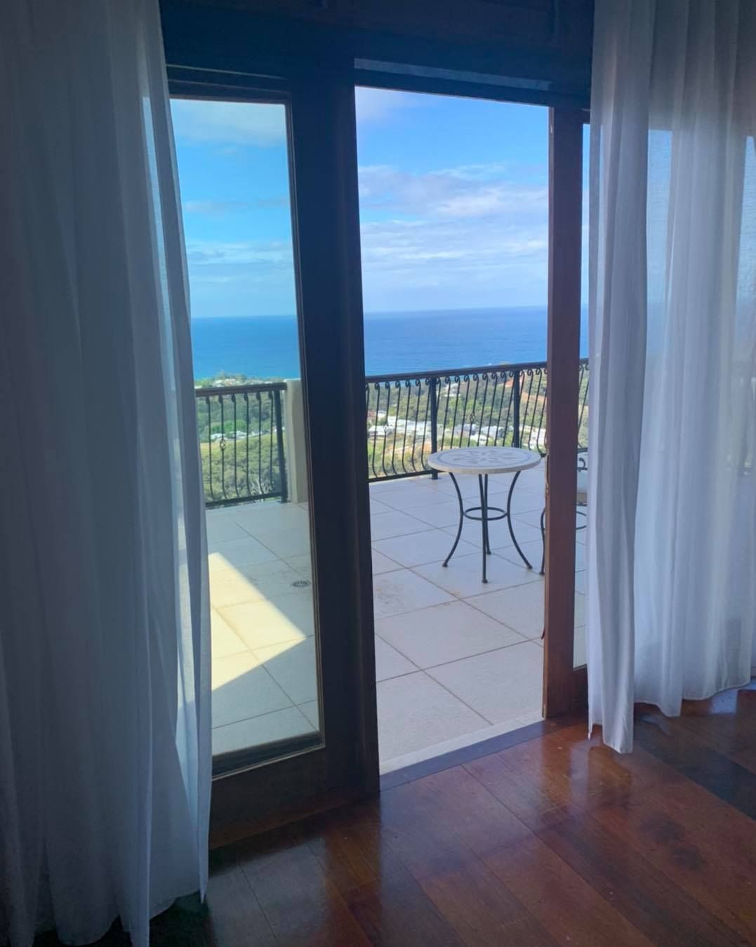 A Room With A Sliding Glass Door Leading To A Balcony — Caba's Drapery In Coffs Harbour, NSW