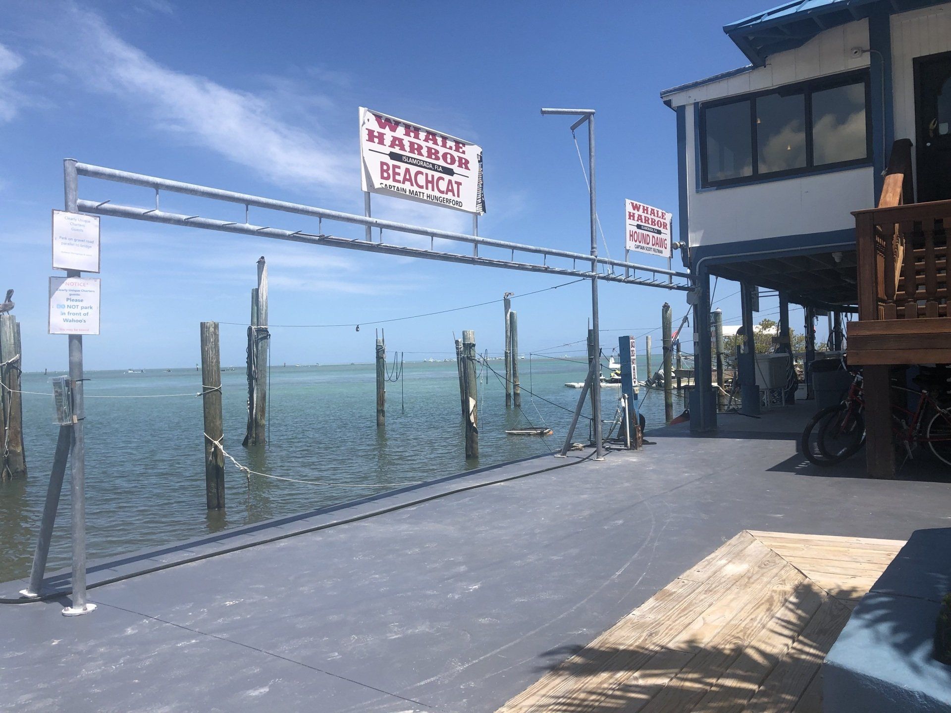 A dock with a sign that says 