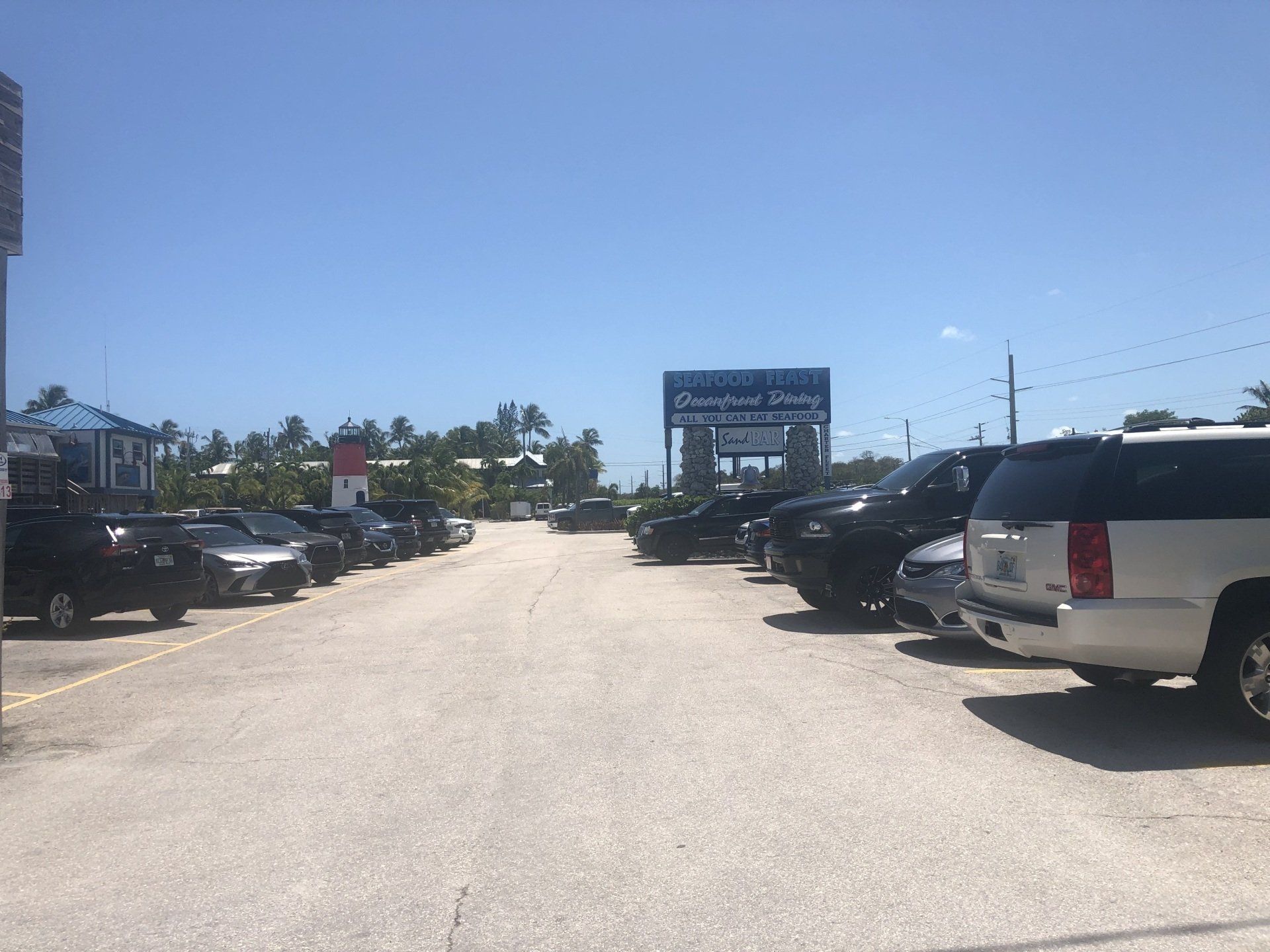 A lot of cars are parked in a parking lot