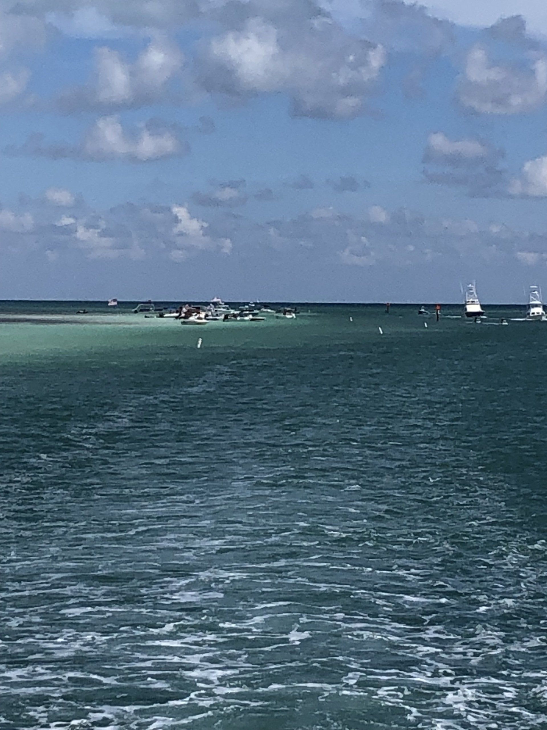 A large body of water with boats in it