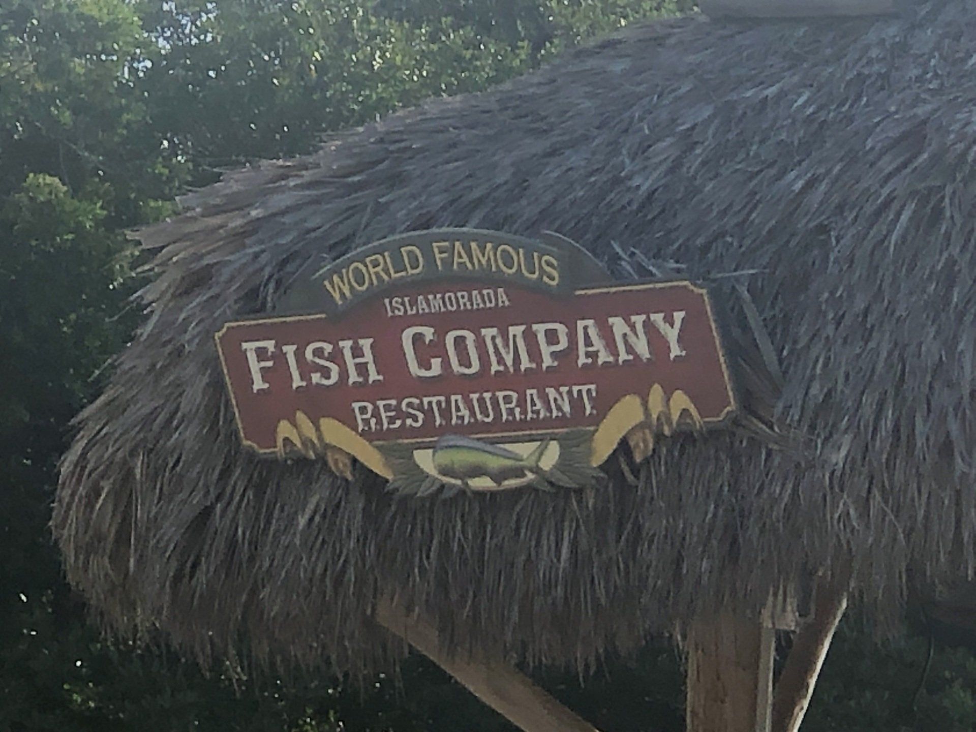 A sign for the world famous fish company restaurant