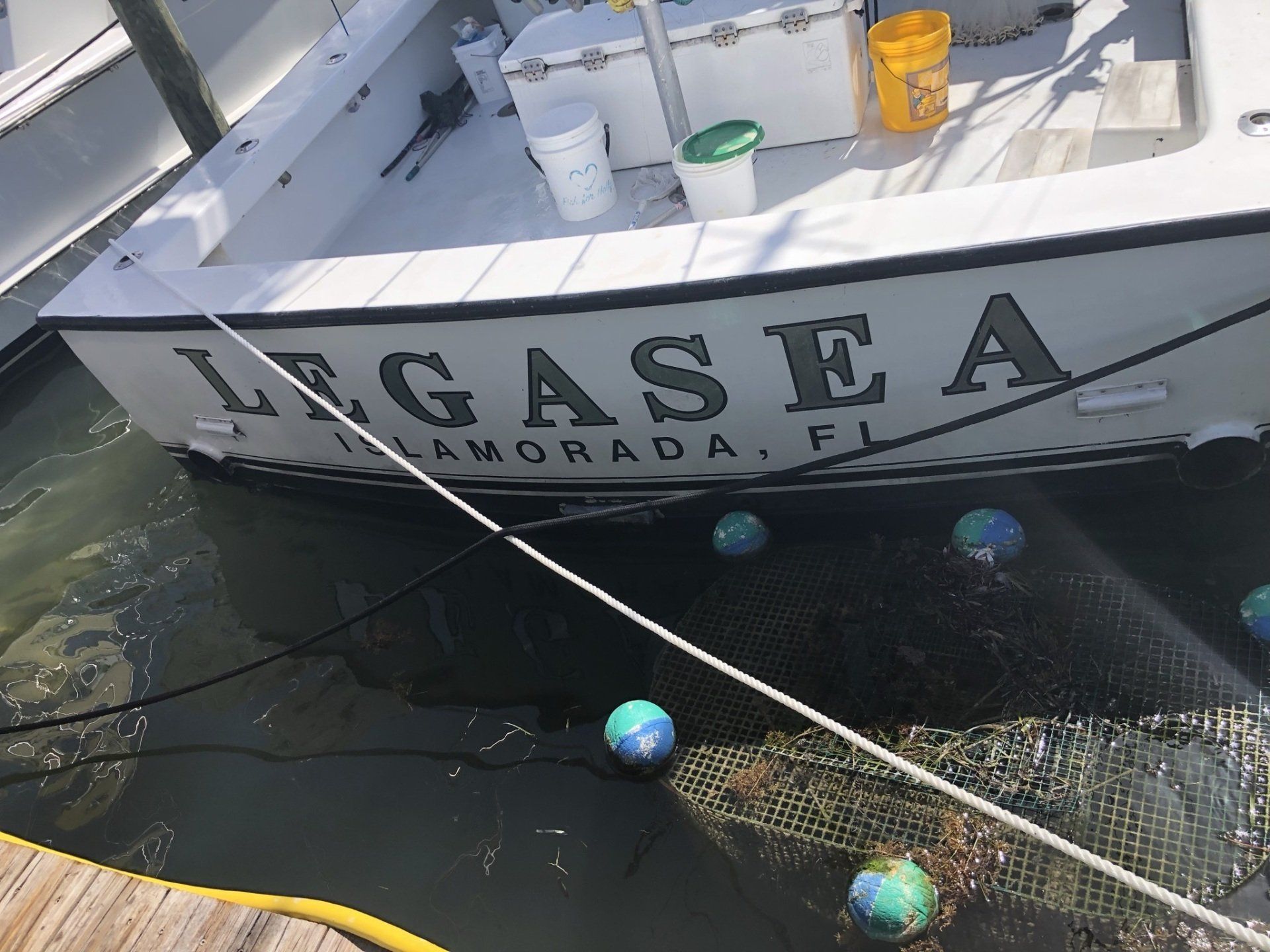A boat with the name legasea painted on it