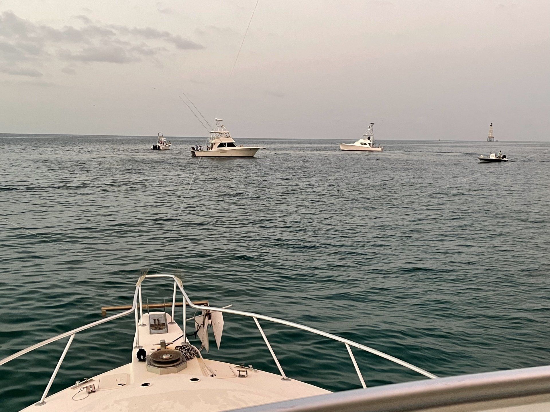 A boat is in the middle of a large body of water