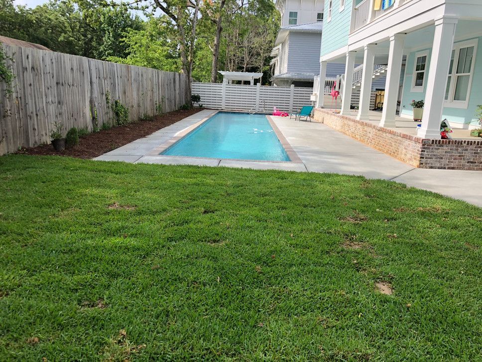 Backyard Swimming Pool — Long Beach, MS — Greenscape Brothers
