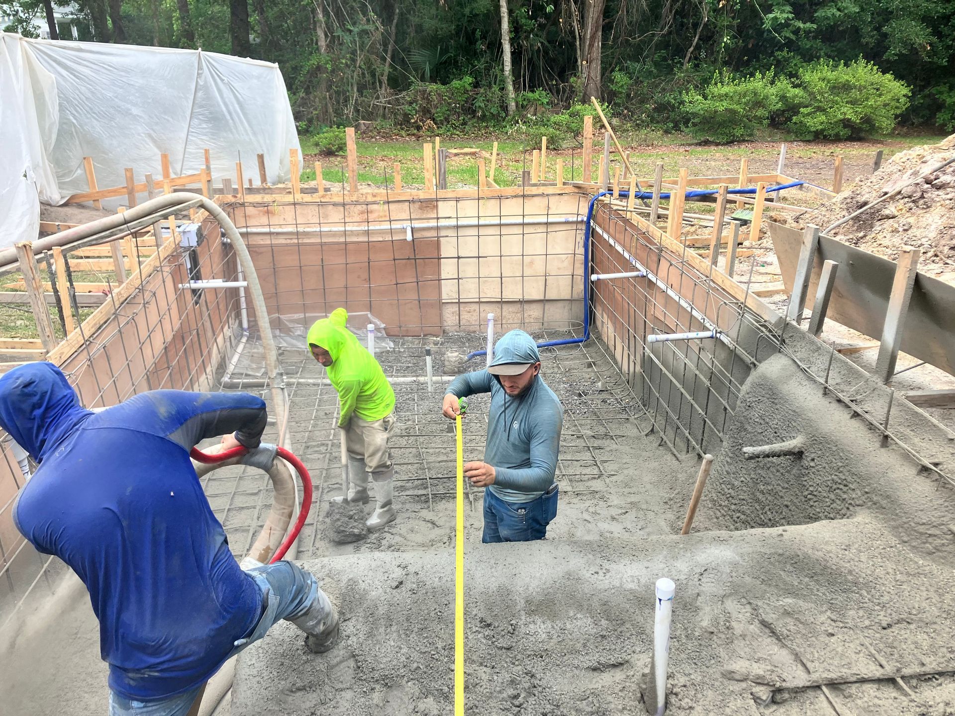 Professional workers building the swimming pool — Long Beach, MS — Greenscape Brothers