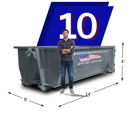 A man in front of a dumpster