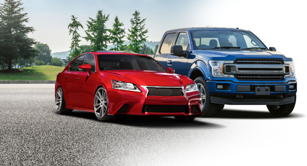 A red car and a blue truck are parked next to each other on a road.  | Halton Auto Service & Transmission
