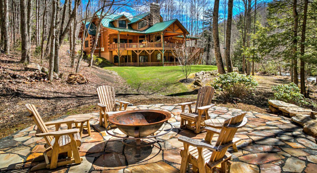 There is a fire pit in the middle of the patio.