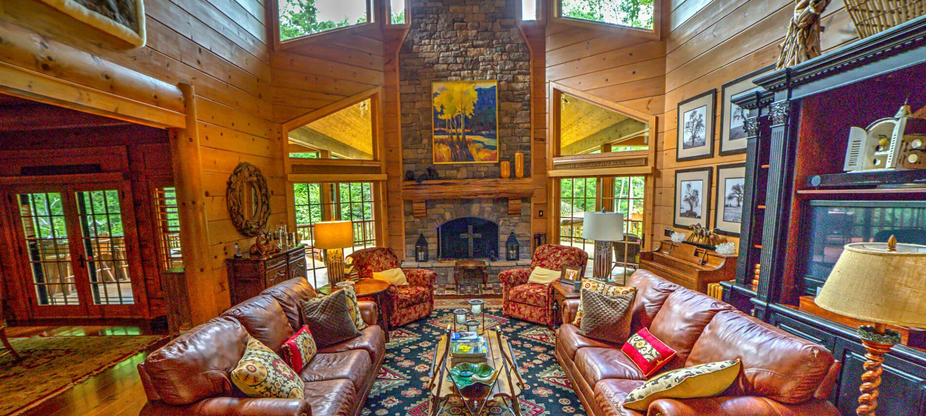 A living room filled with furniture and a fireplace.