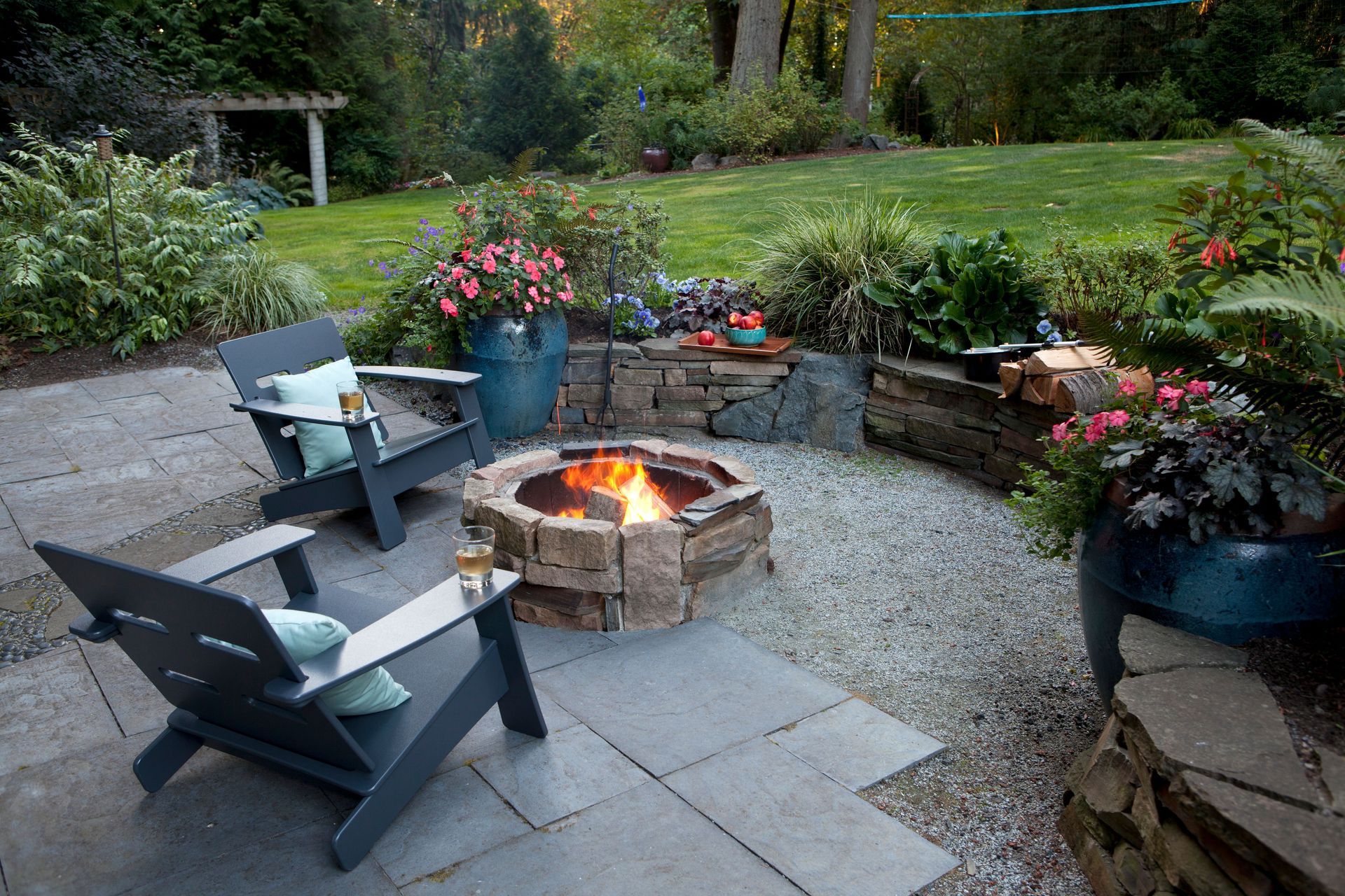 Professionally landscaped residential property with patio and structured planting beds.