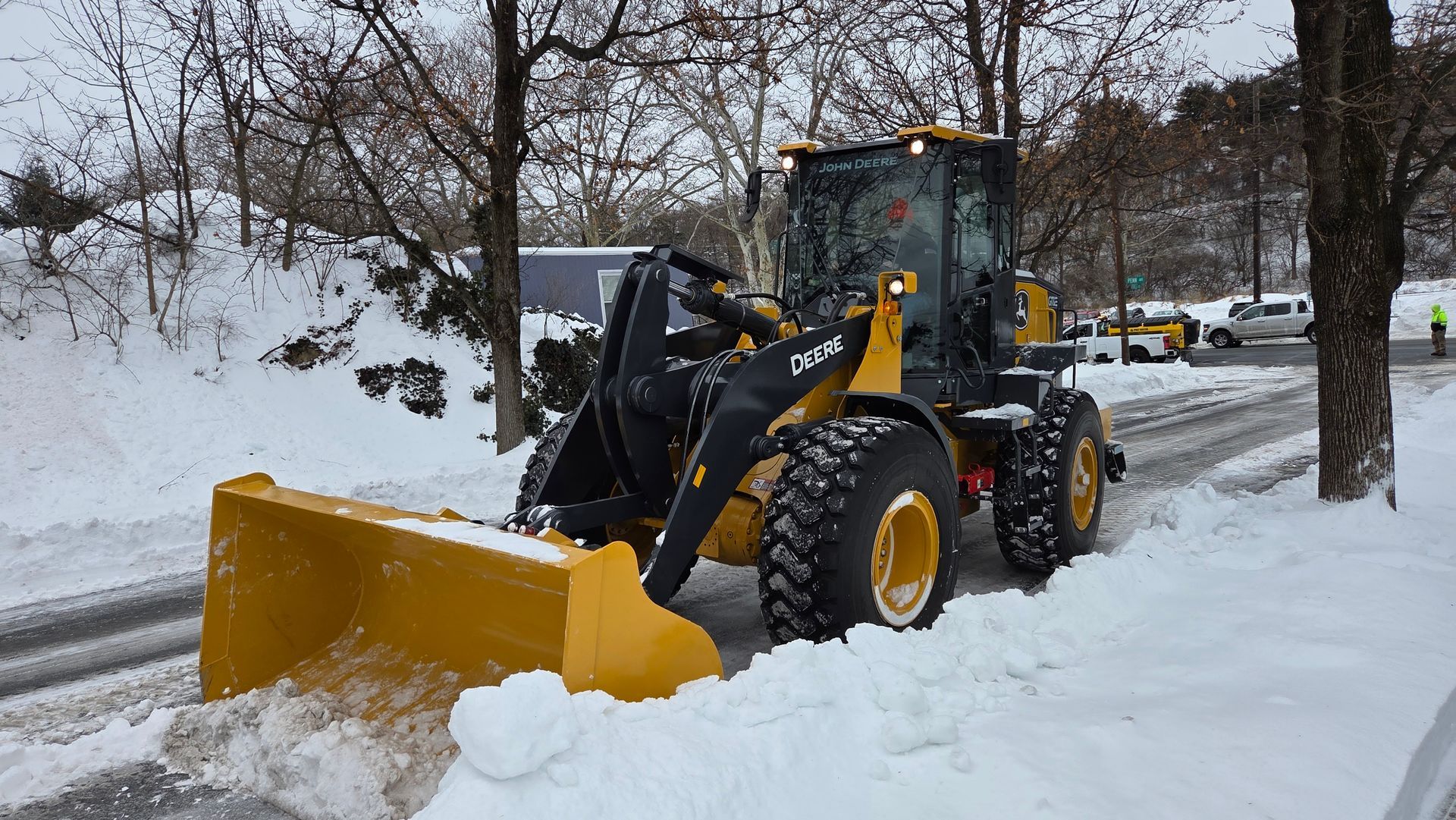 Empire Services' wheel loader removing snow in a Berk County community. 