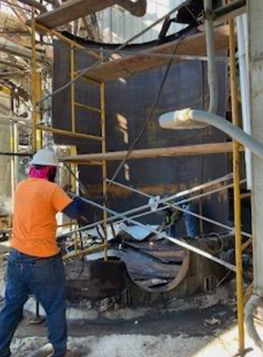 Cleaning a Vertical Tank 