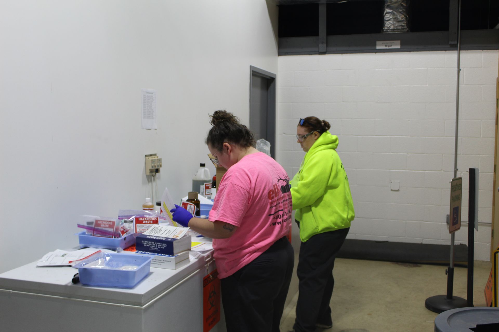 Elk's Liza Ruiz and Taylor Munich perform a lab packing at a local university. 