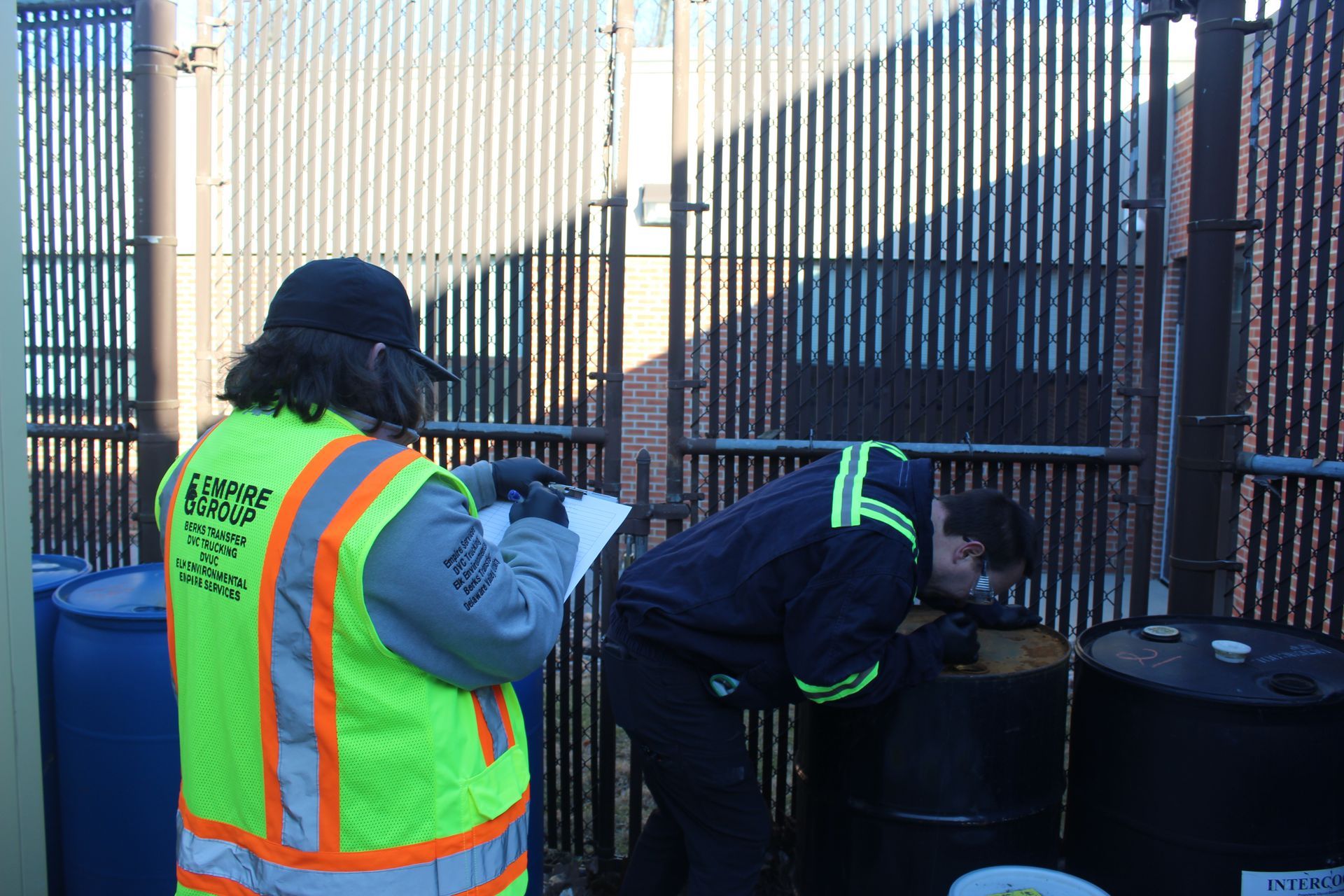 The Elk Environmental Services team takes waste  samples.