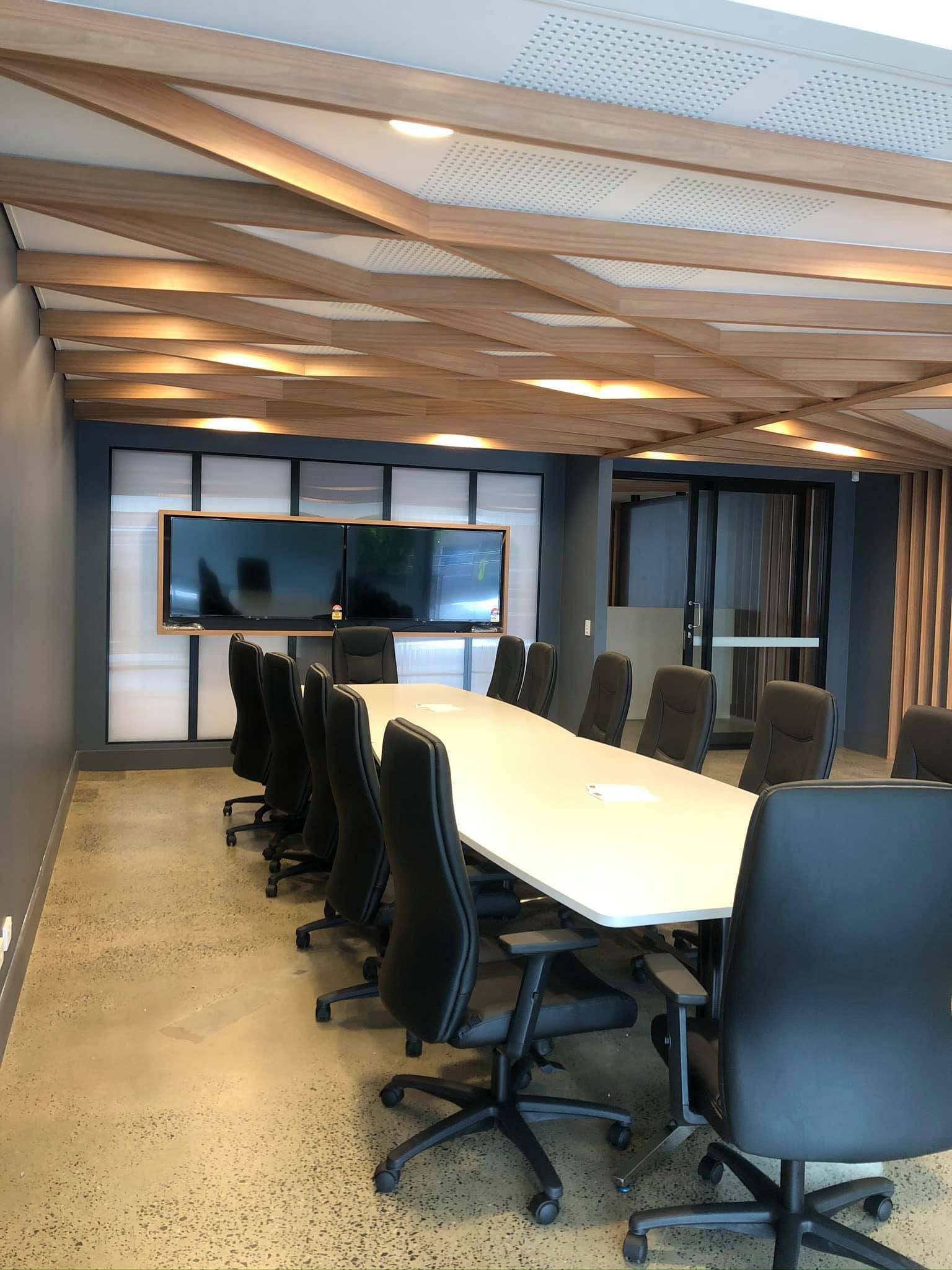 A Large Conference Room With A Long Table And Chairs — North Coast Cabinets In South Lismore, NSW