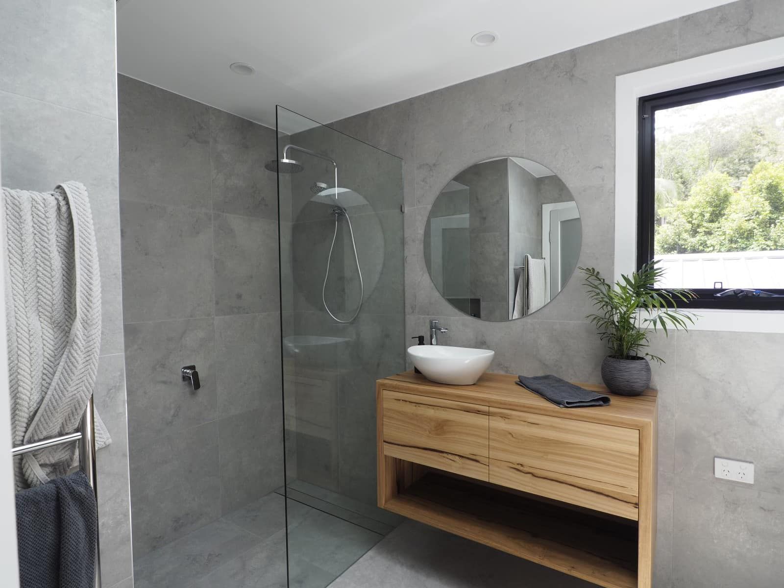 A Bathroom With A Sink , Mirror And Walk In Shower — North Coast Cabinets In Casino, NSW