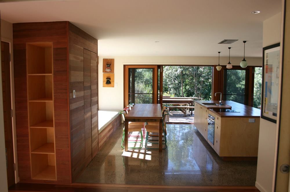 A Kitchen With A Table And Chairs In It — North Coast Cabinets In South Lismore, NSW
