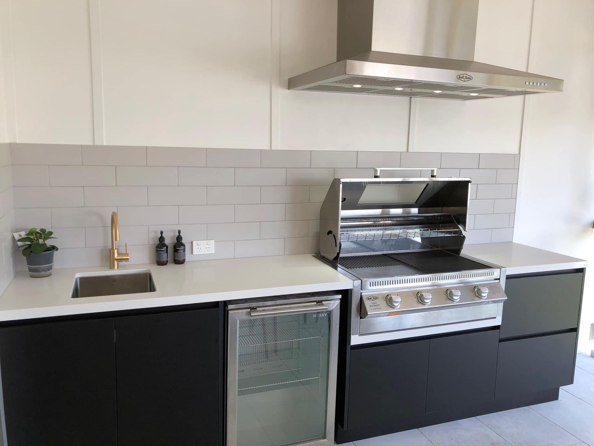 A Kitchen With Cabinets And Stainless Steel Appliances — North Coast Cabinets In Murwillumbah, NSW