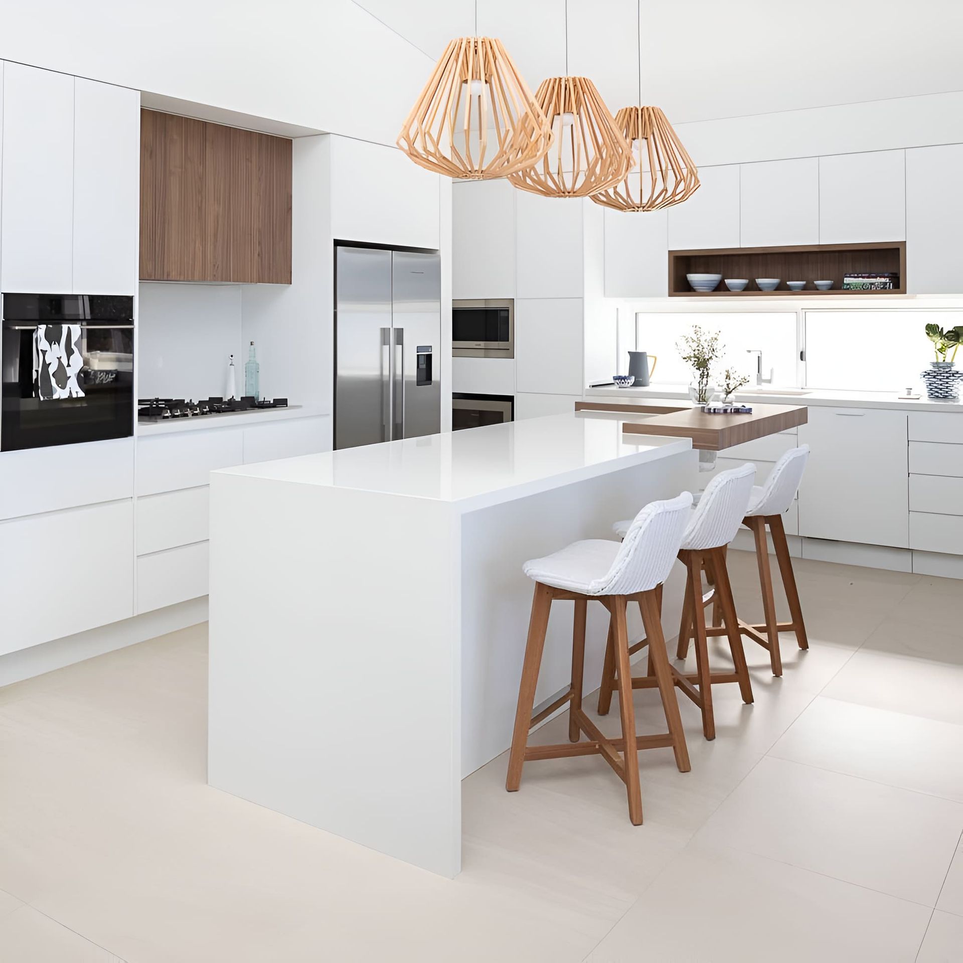 A Kitchen With White Cabinets And Wooden Stools — North Coast Cabinets In South Lismore, NSW