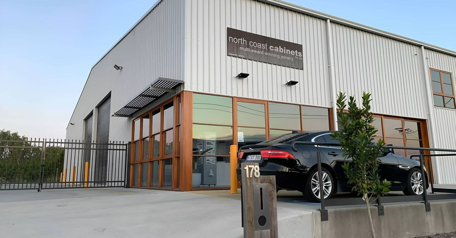 A White Truck Is Parked In Front Of A Building — North Coast Cabinets In South Lismore, NSW