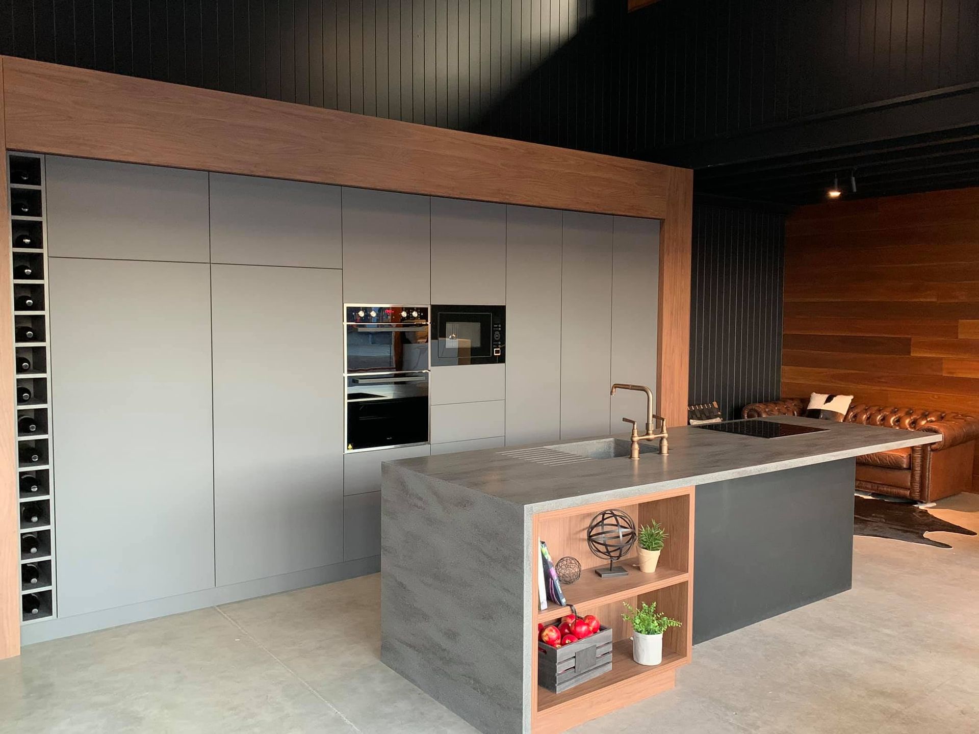A Kitchen With A Large Island In The Middle Of The Room — North Coast Cabinets In Casino, NSW