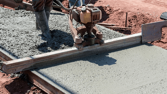 a concrete contractor installing a sidewalk