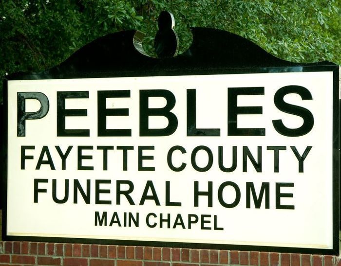 a sign for Peebles Fayette Couny Funeral Home Main Chapel in Somerville, TN
