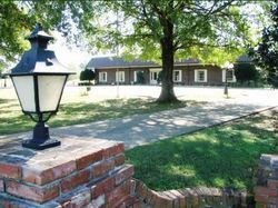 Exterior view with lamp post of Peebles Fayette County Funeral Homes and Cremation Center in Somerville, TN.