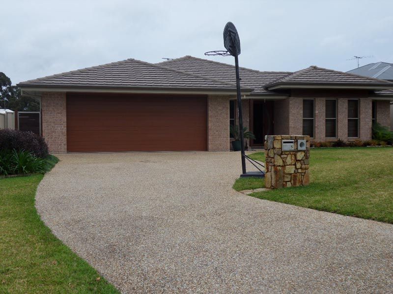 House with a Driveway — Coffs Harbour, NSW — Coolamon Concrete Tanks