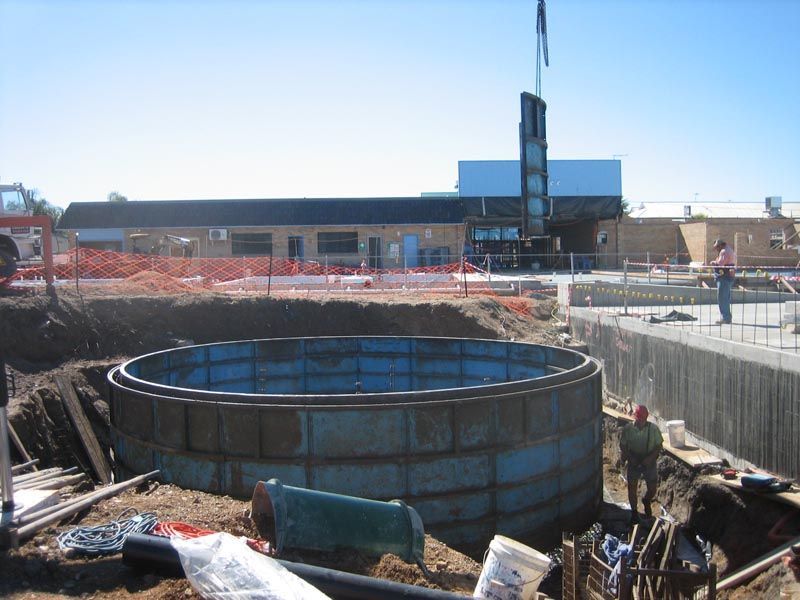 Large Blue Metal Tank Construction — Coffs Harbour, NSW — Coolamon Concrete Tanks
