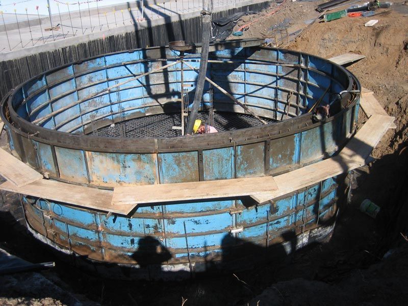 Large Round Blue Container with Metal Bars — Coffs Harbour, NSW — Coolamon Concrete Tanks