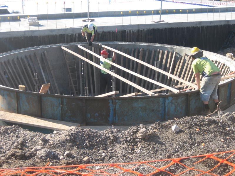 Construction Workers Working on a Large Tank — Coffs Harbour, NSW — Coolamon Concrete Tanks