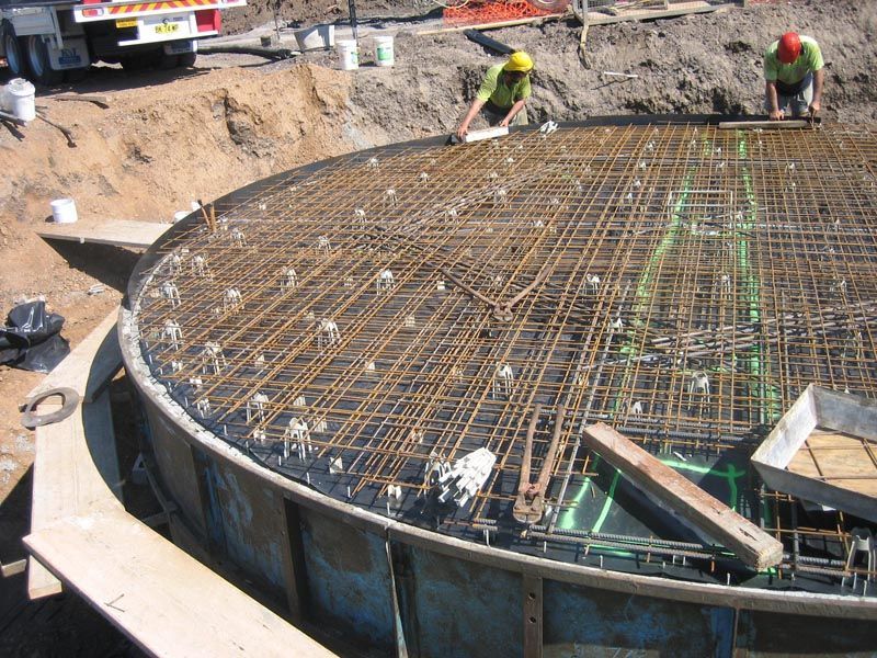 Person Working on a Construction Site — Coffs Harbour, NSW — Coolamon Concrete Tanks