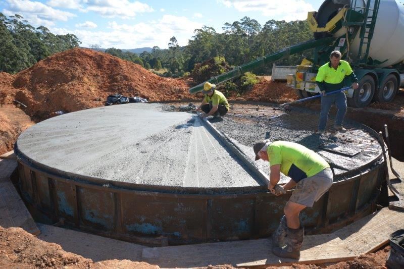 Group of Men Working on a Construction Site — Coffs Harbour, NSW — Coolamon Concrete Tanks