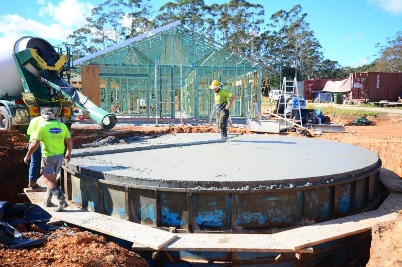 Few Men Working on a Construction Site — Coffs Harbour, NSW — Coolamon Concrete Tanks