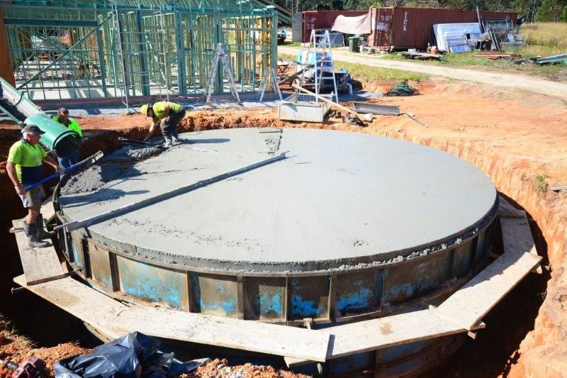 Workers Woking on Concrete Slab — Coffs Harbour, NSW — Coolamon Concrete Tanks