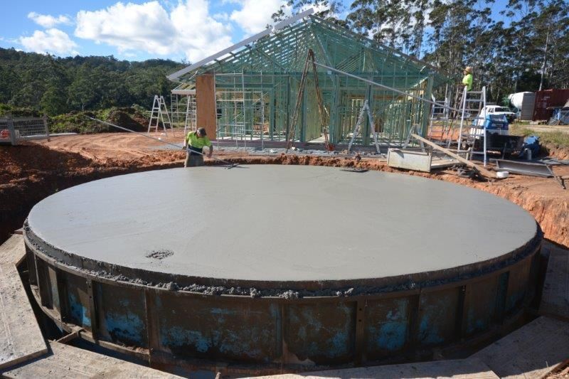 Worker Woking on Large Concrete Slab — Coffs Harbour, NSW — Coolamon Concrete Tanks