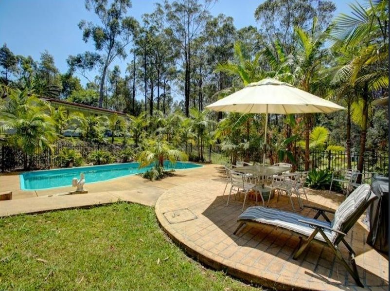 Pool and Chairs in a Backyard — Coffs Harbour, NSW — Coolamon Concrete Tanks