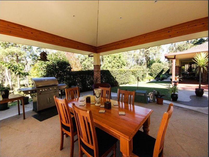 Dining Table and Chairs on a Patio — Coffs Harbour, NSW — Coolamon Concrete Tanks