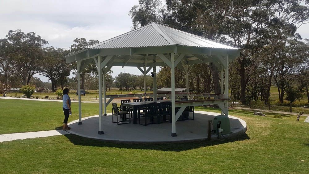 Gazebo with Table and Chairs on a Grassy Field — Coffs Harbour, NSW — Coolamon Concrete Tanks